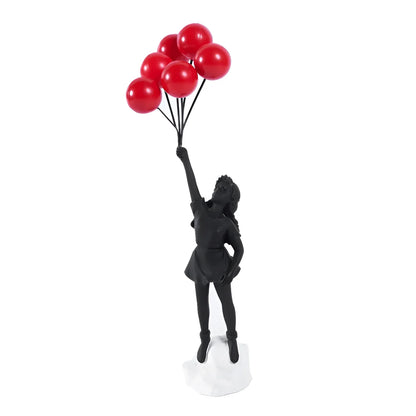 Balloon Girl Resin Statuette depicting a happy child holding a balloon, inspired by urban art style, suitable for décor.